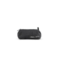 packed up black sling bag on white background