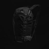 3/4 view of backpack on black background