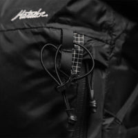 Detail view of backpack trekking pole loop