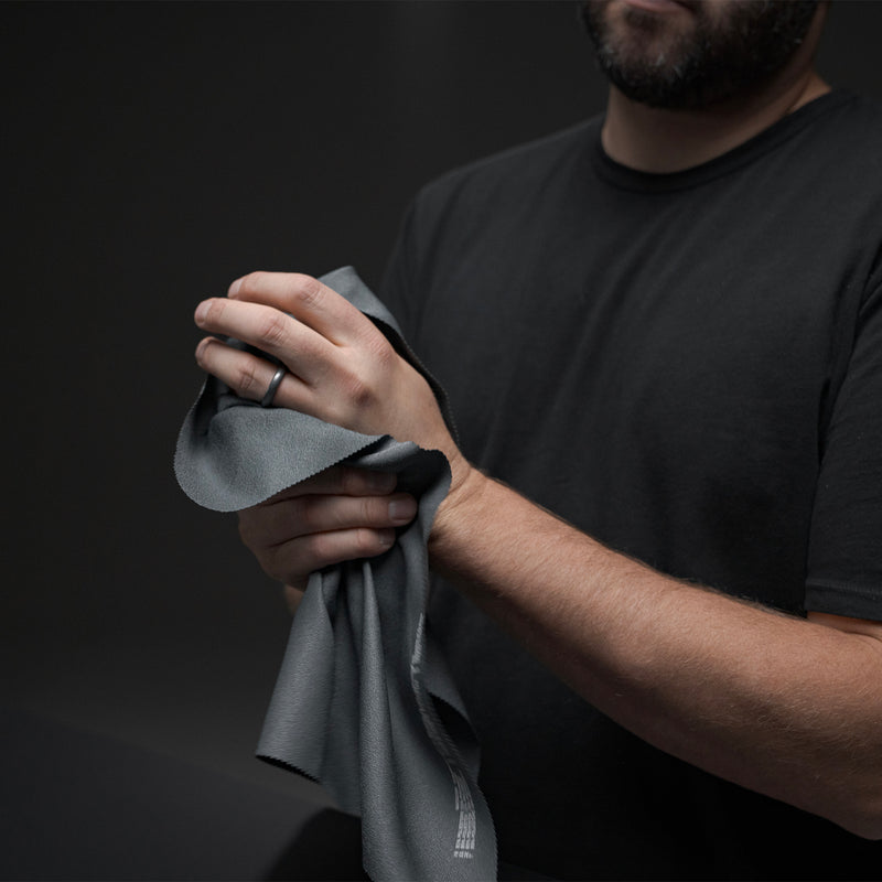 Man drying hands with trek towel